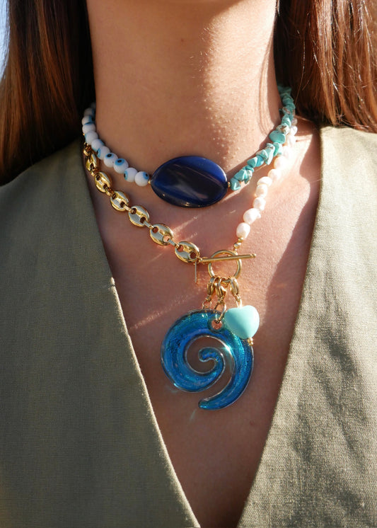 Collar Swimming In The Ocean