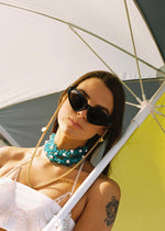 Sunglasses Chain Golden Hours In Honolulu